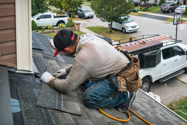 Professional Roofing technician working in Kingston, OK